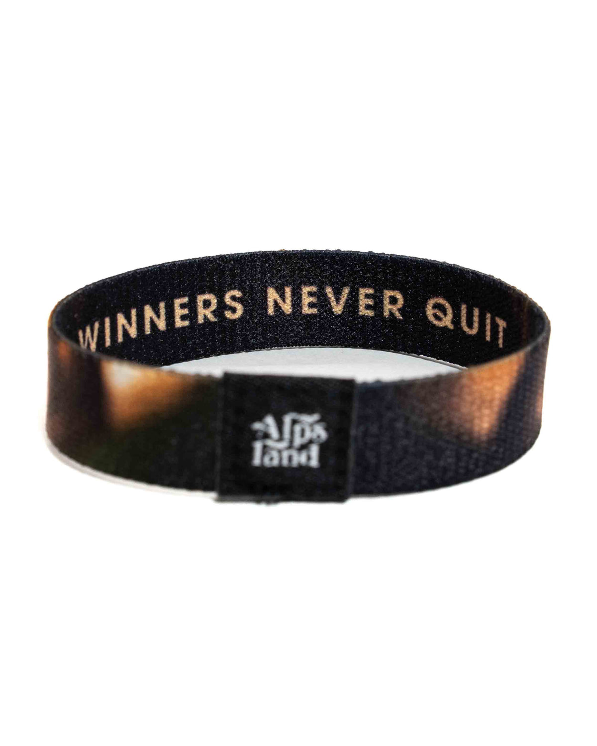 Winners Never Quit Elastisches Armband – Alpsland – Motivation, Sport, Outdoor